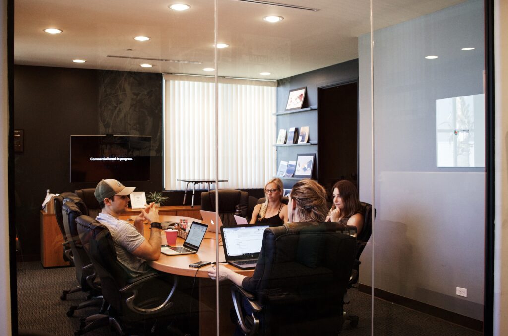 Fractional executive team debating how to solve a business problem